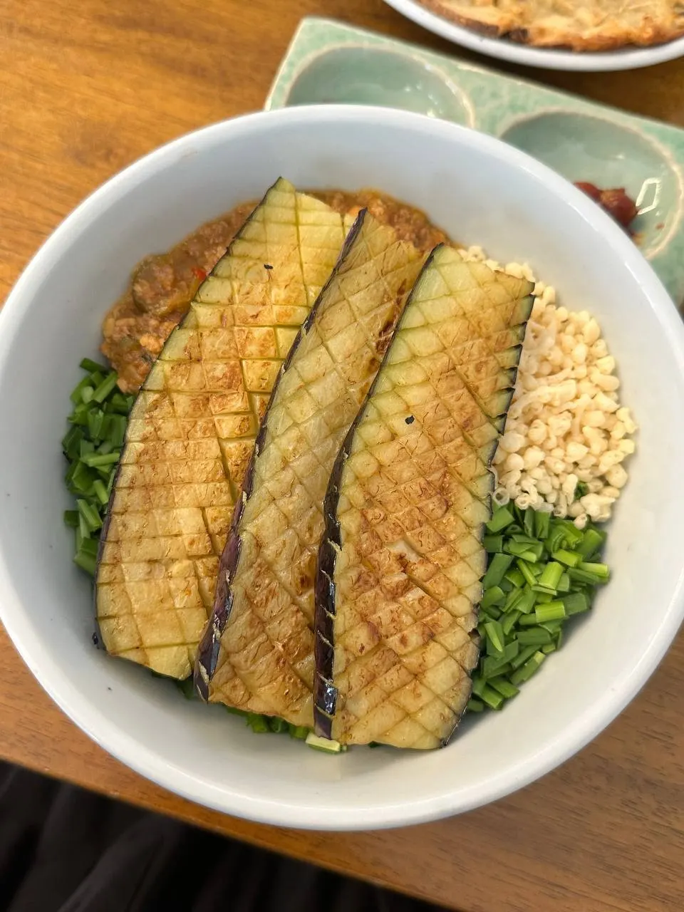 Eggplant doenjang rice bowl topped with thick doenjang sauce