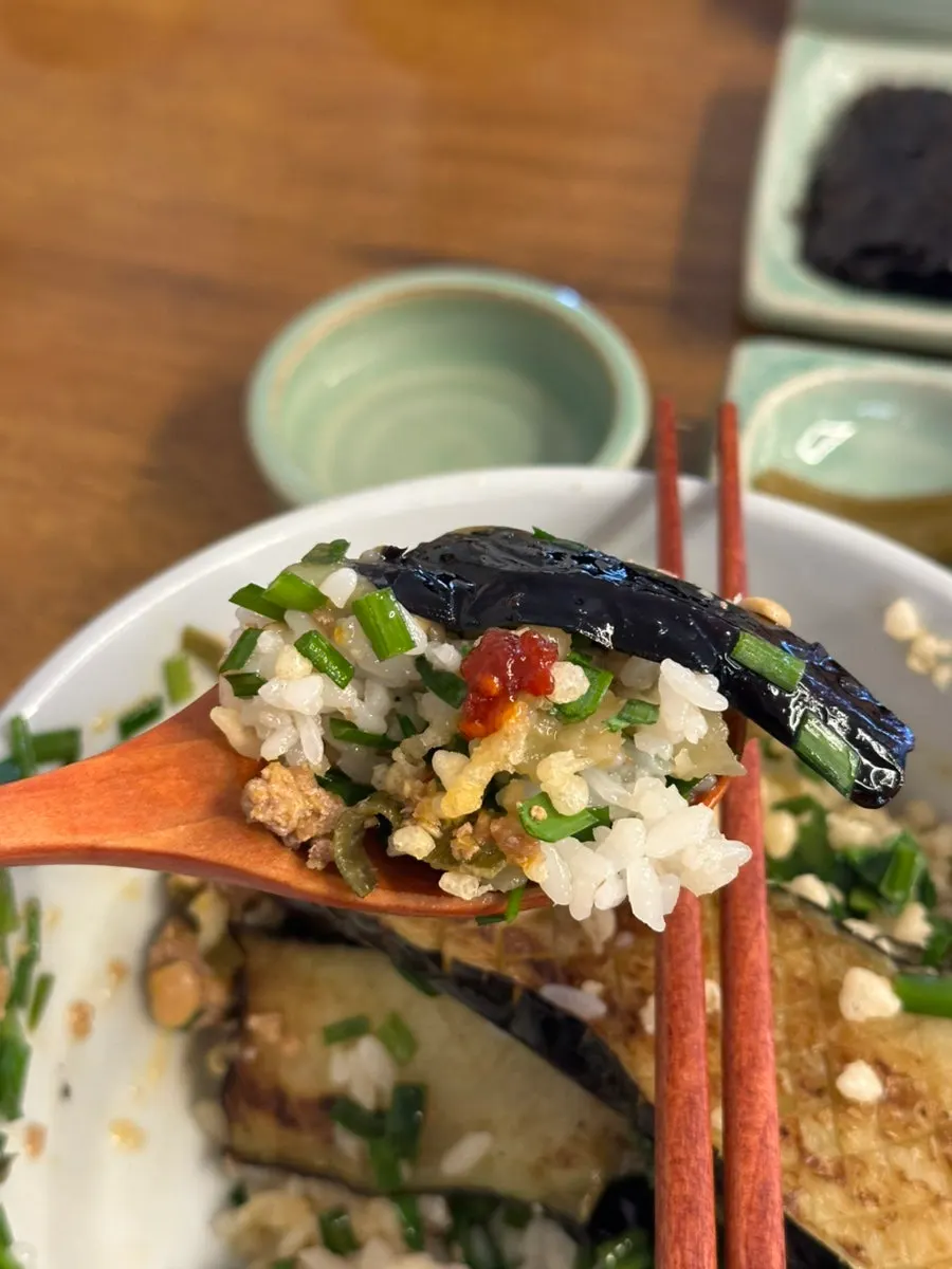 Close-up of the toppings on the eggplant doenjang rice bowl