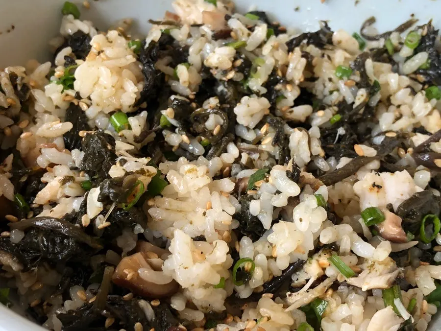 Flaking apart the thick grilled mackerel