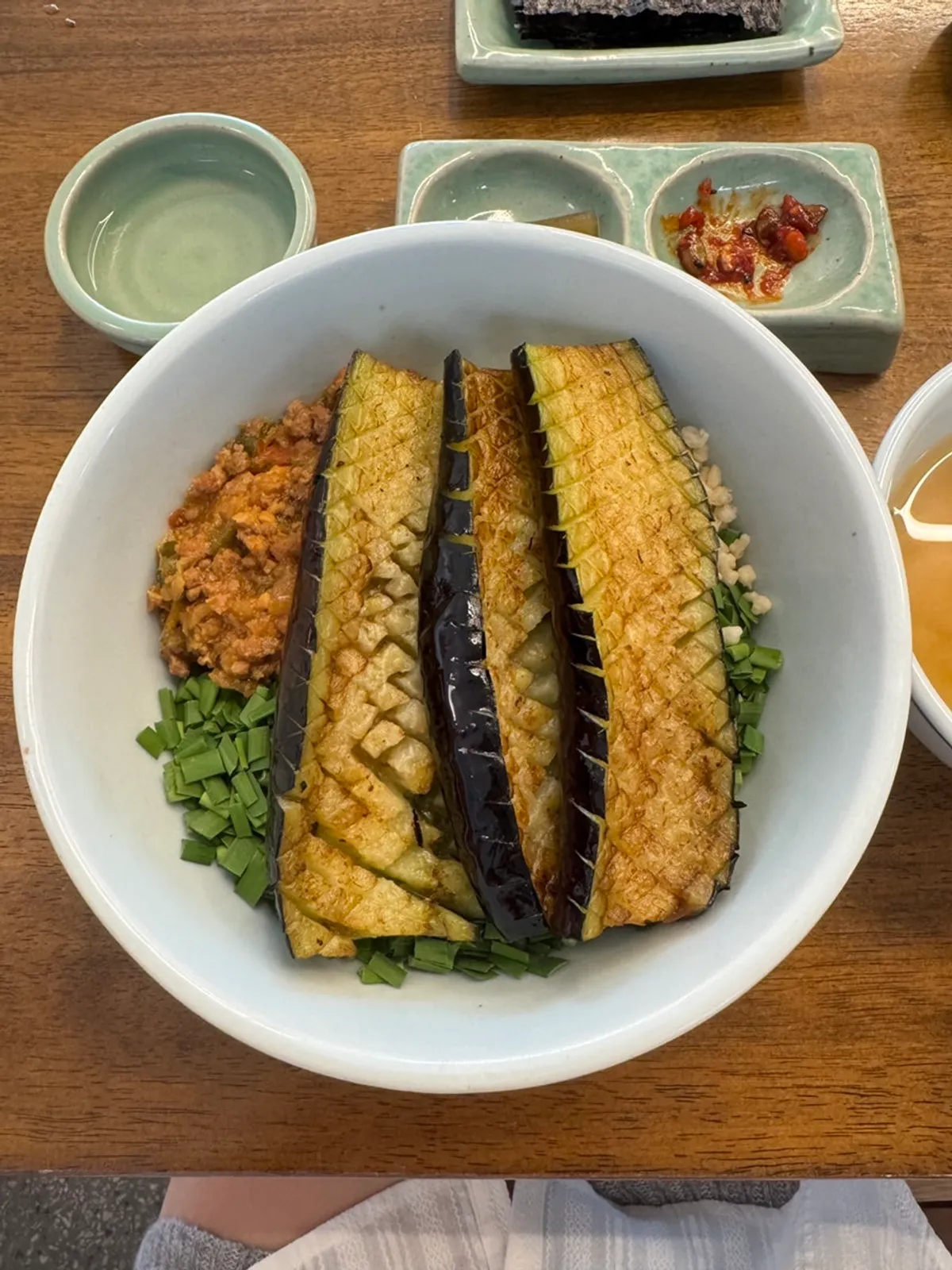 Soup and side dishes served in small plates