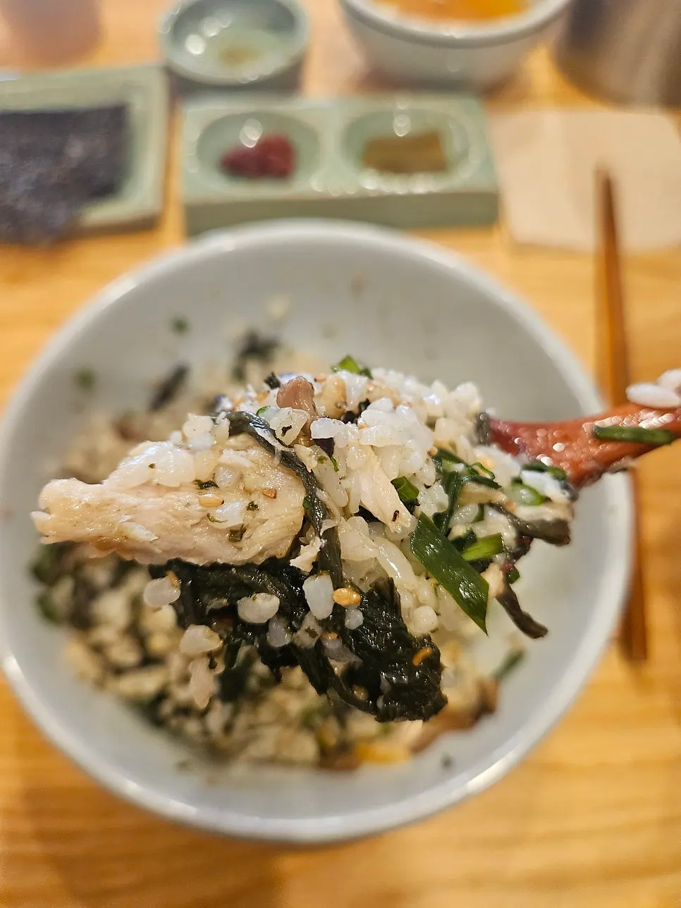 Deboned mackerel flesh with a spoonful of bibimbap