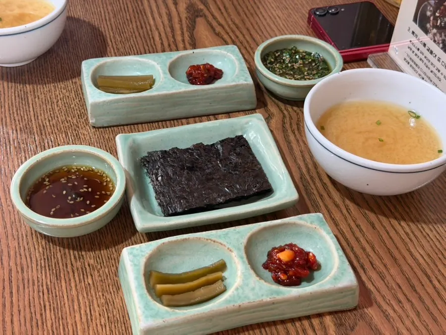 Basic side dish spread with seaweed, pickles and salted seafood