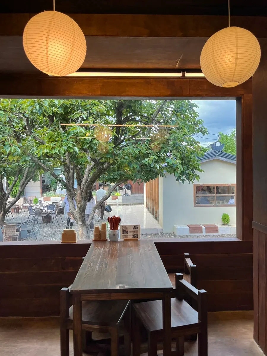 Wooden hanok interior structure and soft lighting at Hyangtaek