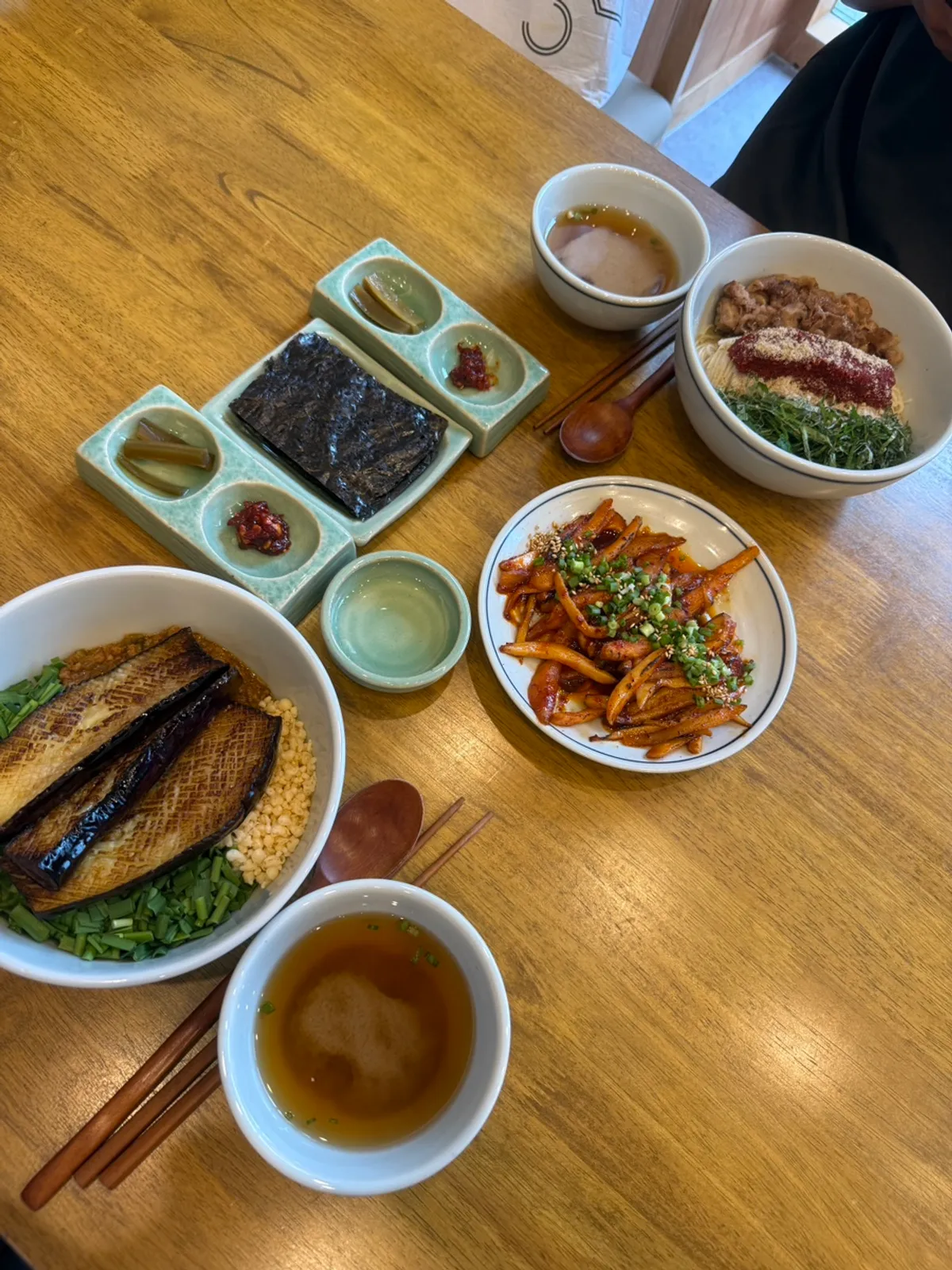 Small dish of kelp vinegar to pour over the eggplant rice bowl