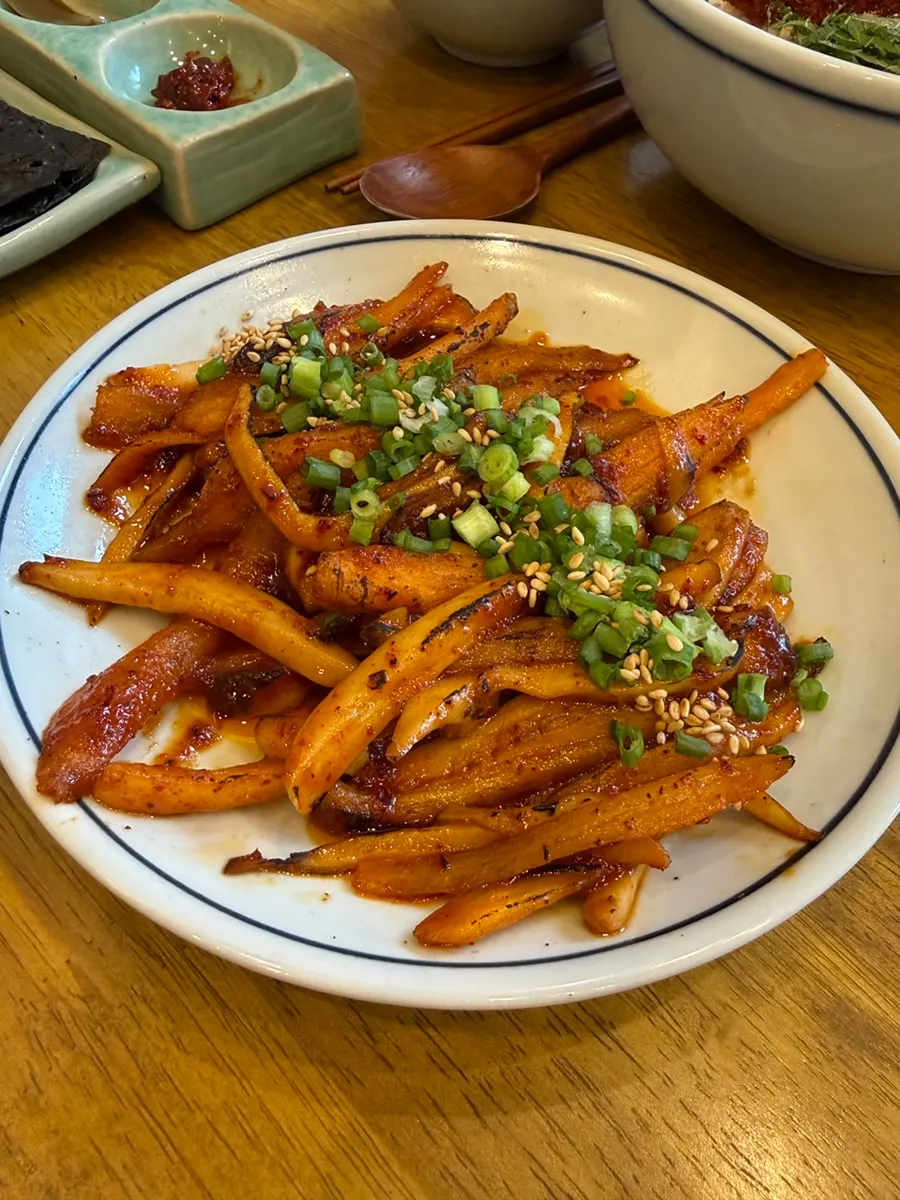 A generous bowl of herring roe bibim noodles with meat