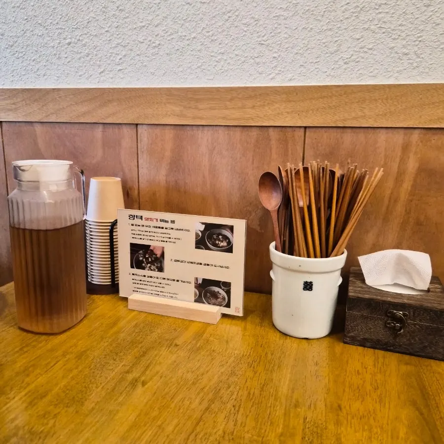 Nutty barley tea served by staff