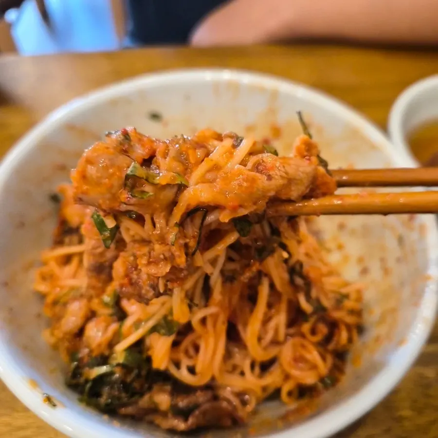 Herring roe bibim noodles evenly mixed together