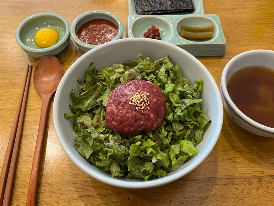 Yukhoe bibimbap and eggplant miso rice bowl spread