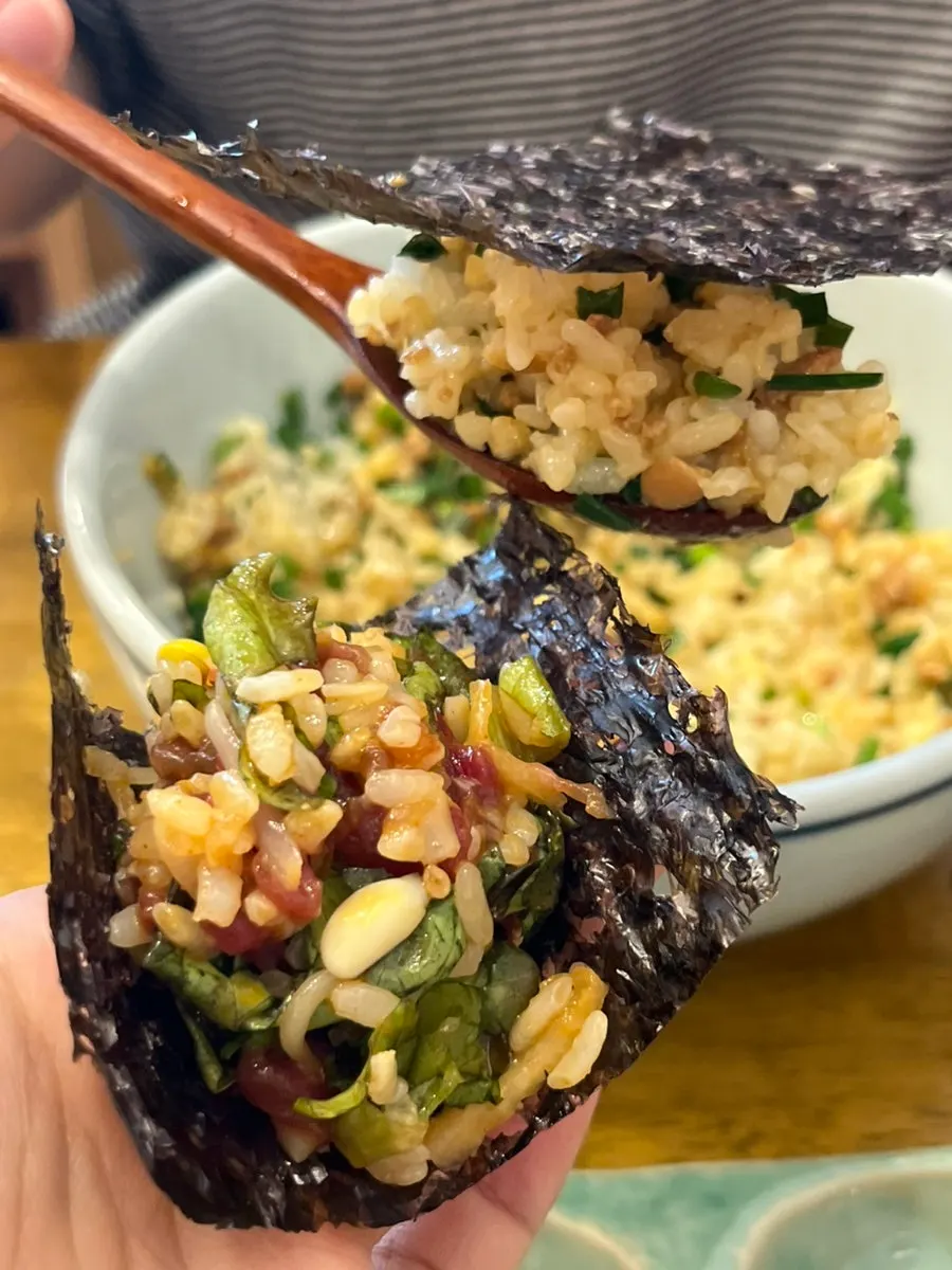 A bite of eggplant miso rice bowl with kelp vinegar