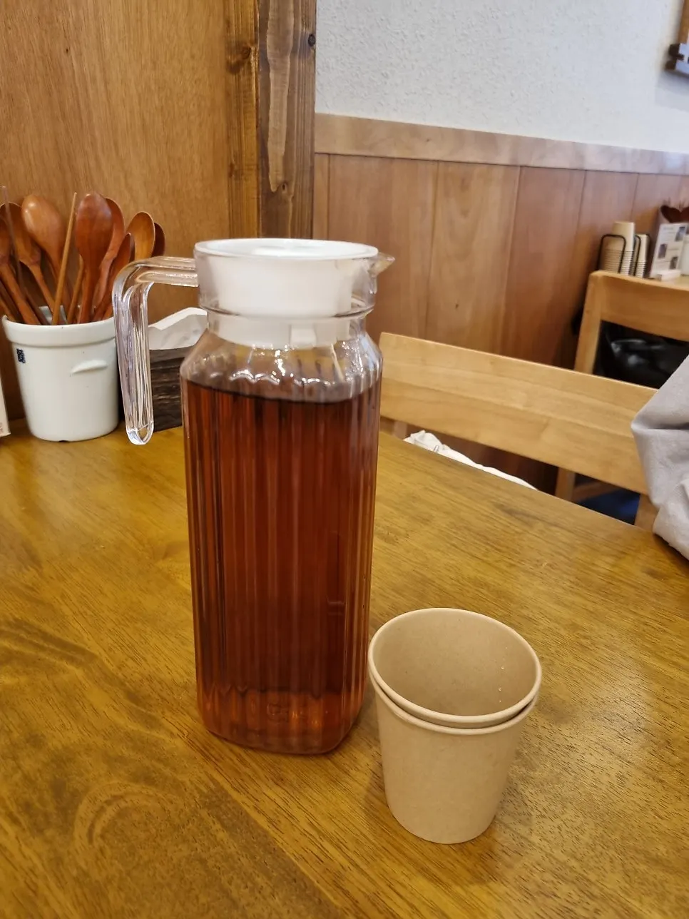 A glass of barley tea served before the meal