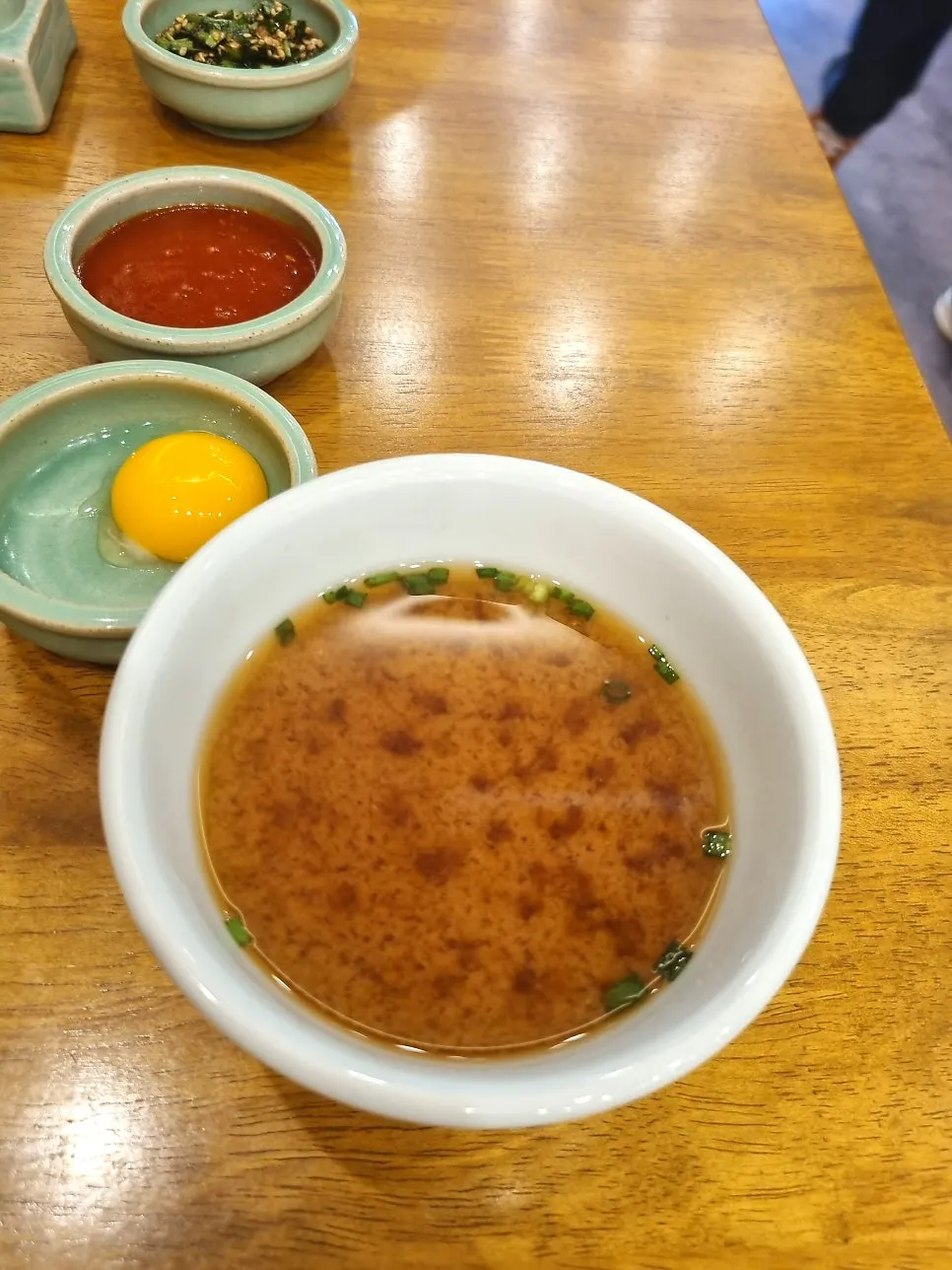 A bowl of warm soup served with the meal