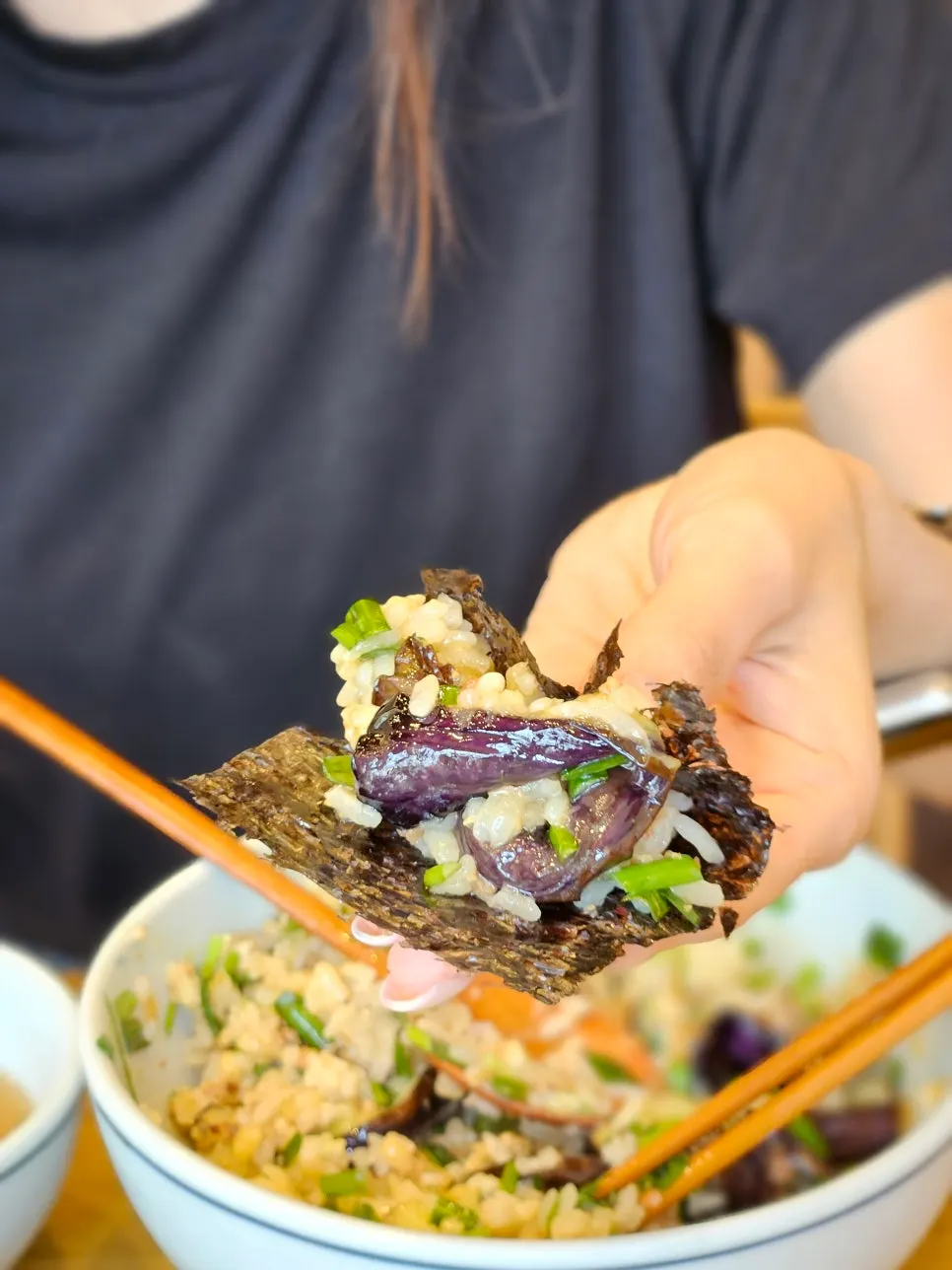 Deonjang rice bowl topped with scored eggplant
