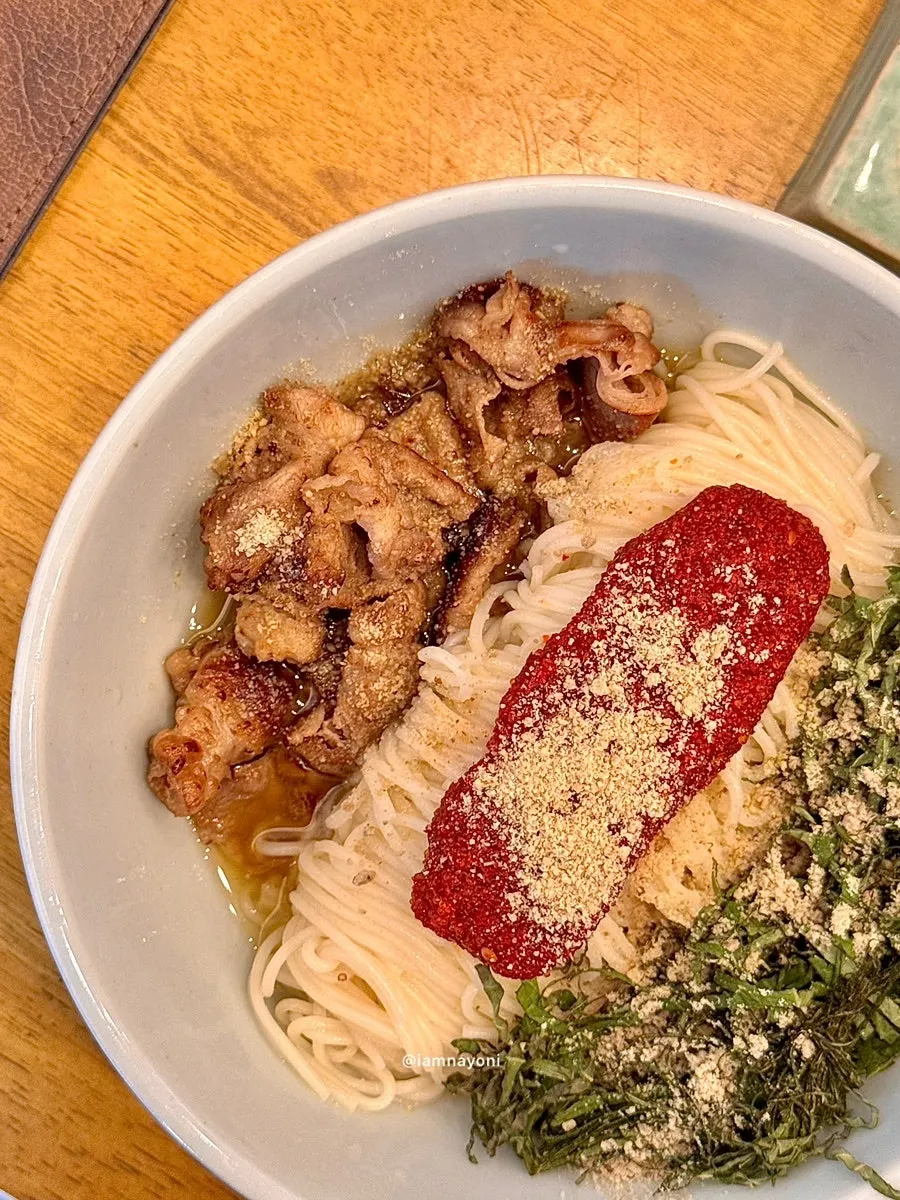 Herring roe bibim noodles at Hyangtaek piled with roe