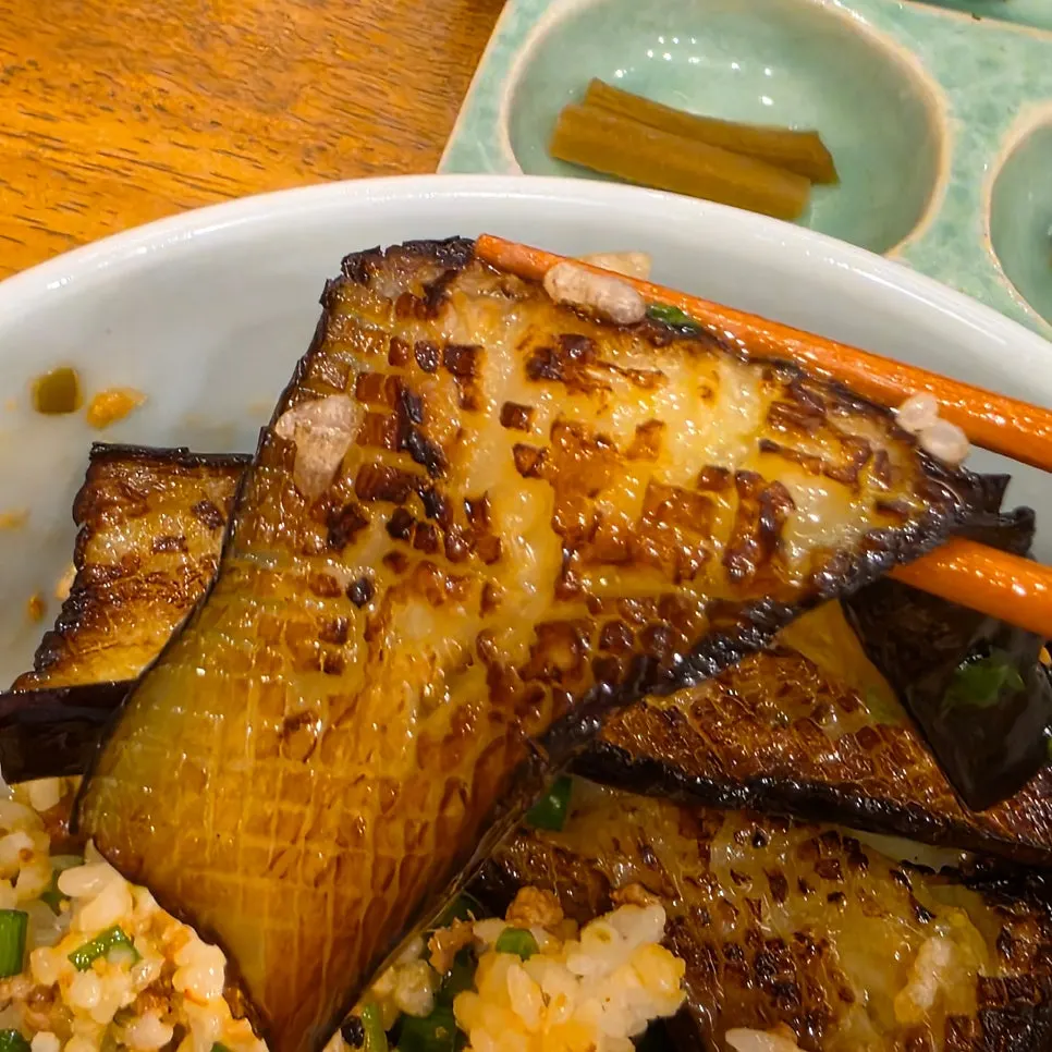 Eggplant torn apart and eaten like a side dish