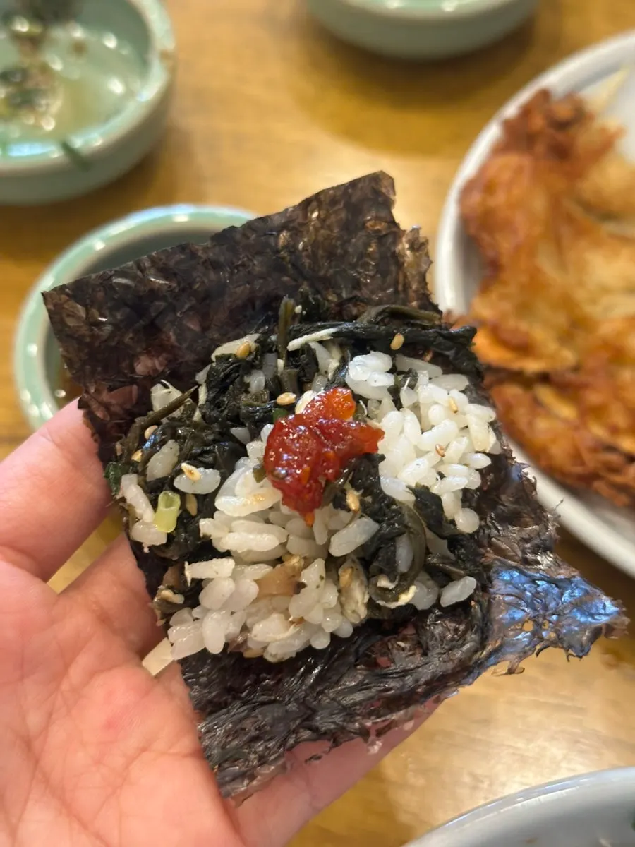 A spoonful of mackerel gondre rice