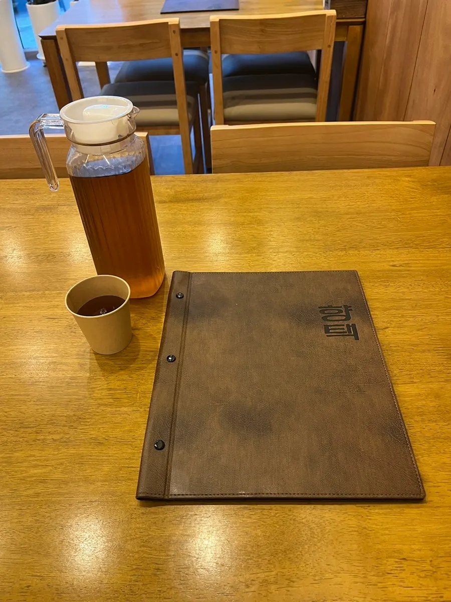 Cup of barley tea on the table