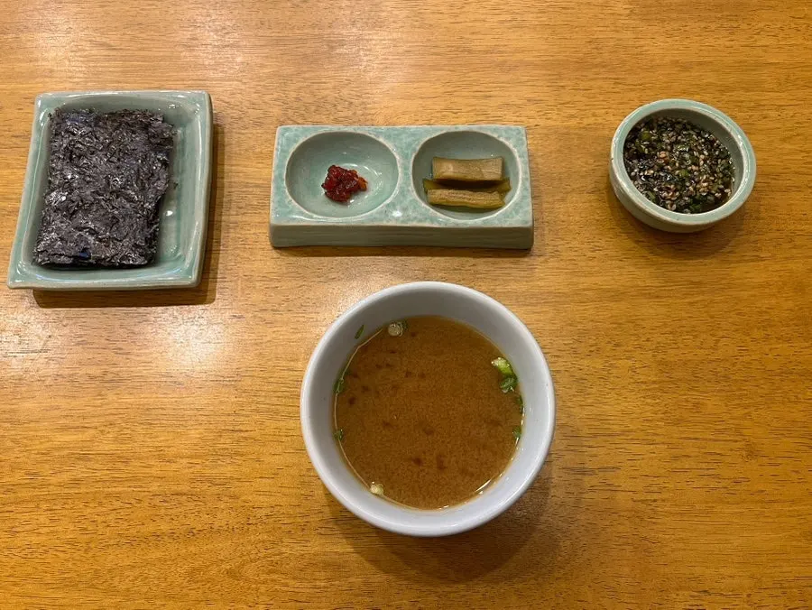 Basic side dishes including soup and pickled cucumber