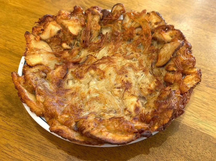 Pan-fried mushroom dish made with shiitake and enoki mushrooms