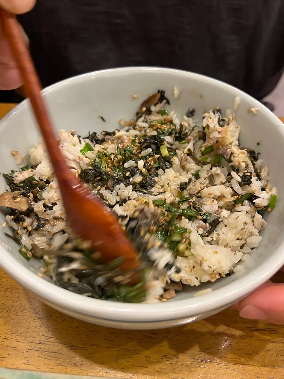 Rice packed with thistle greens alongside grilled mackerel
