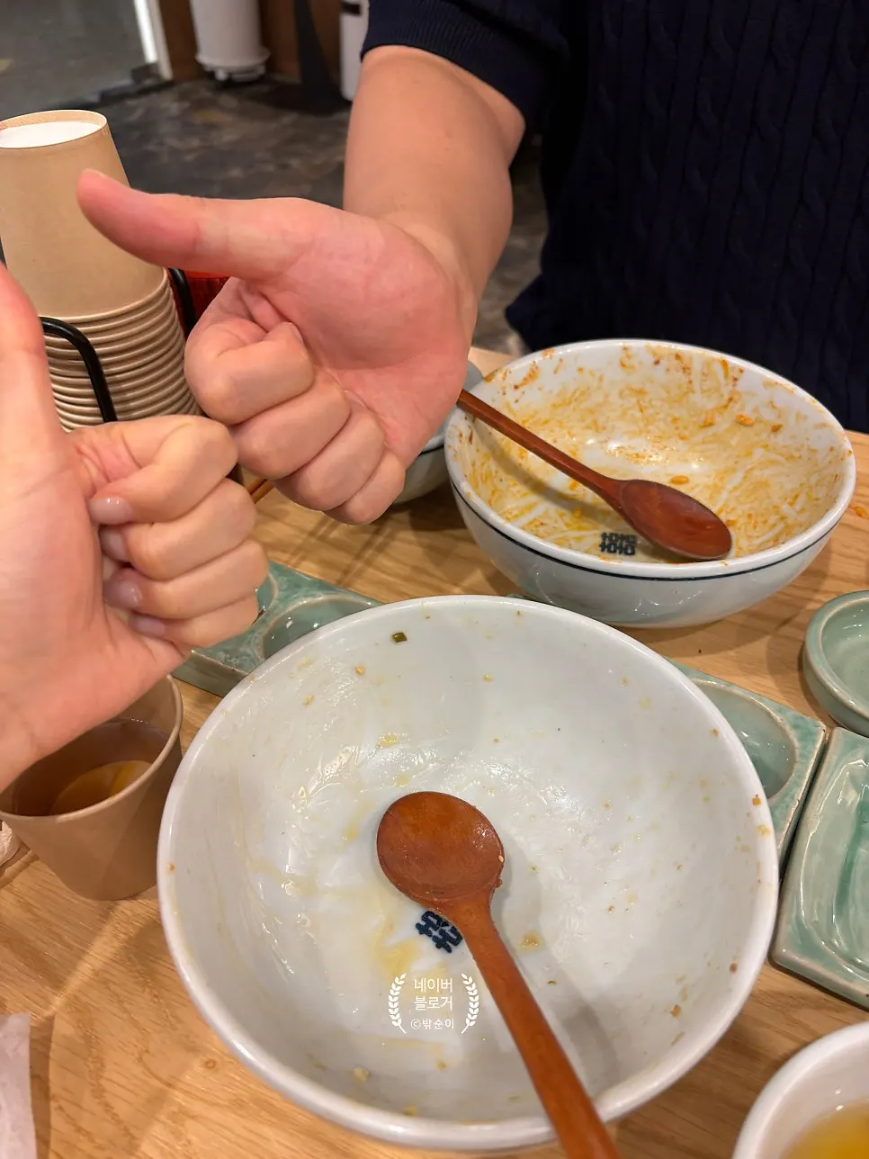 Broth soup served alongside the rice bowls
