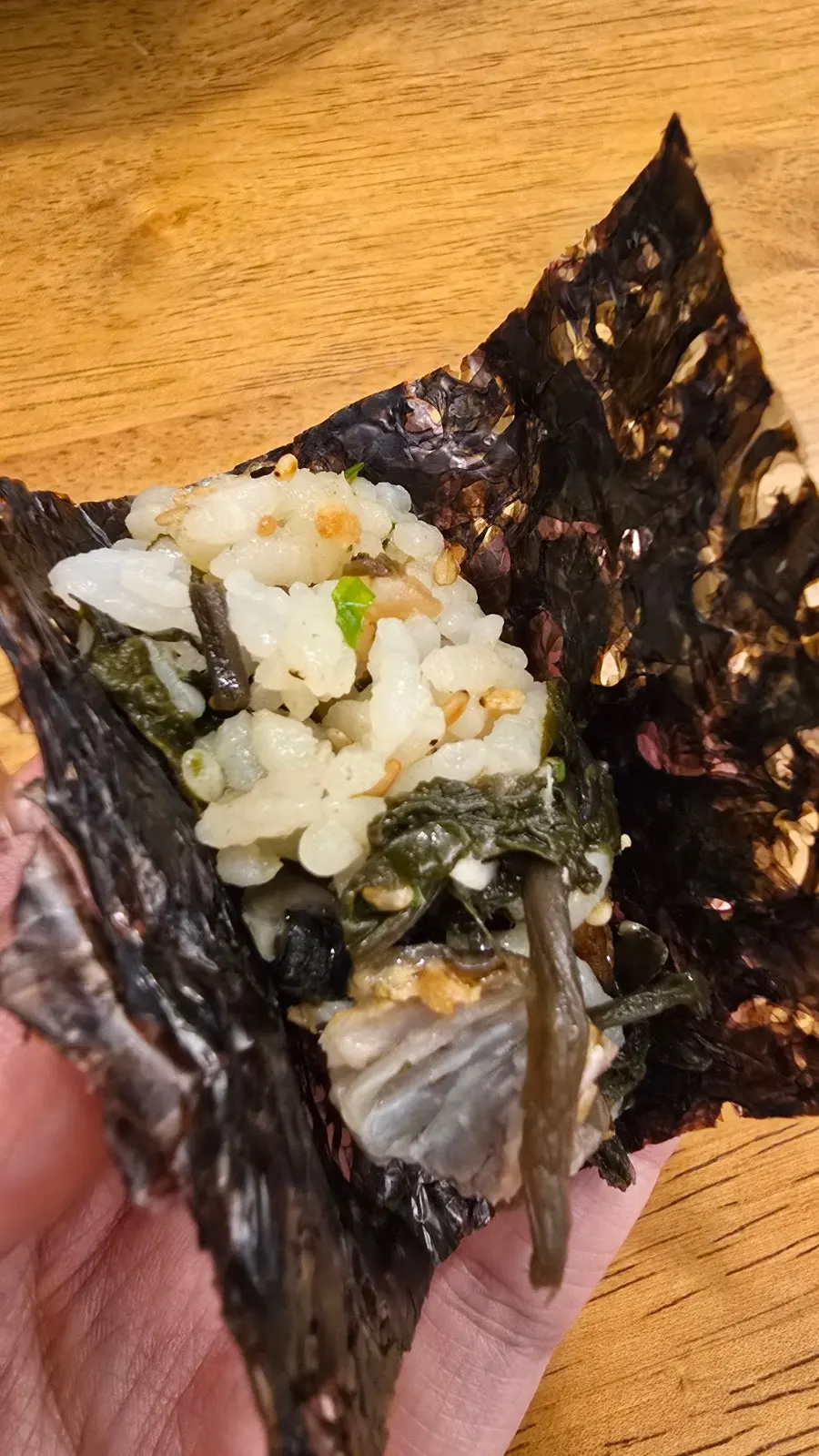 A bite of mackerel gondre rice topped with jeotgal