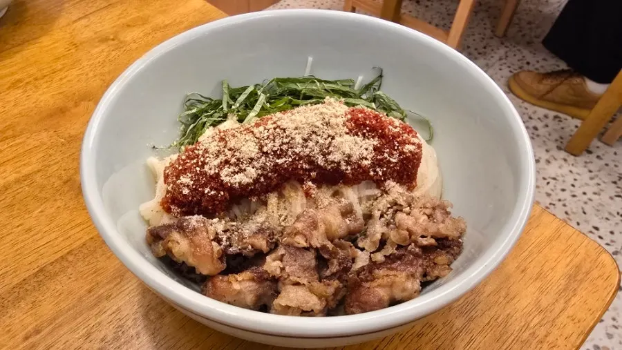 Herring roe bibim noodles with beef brisket and perilla leaves