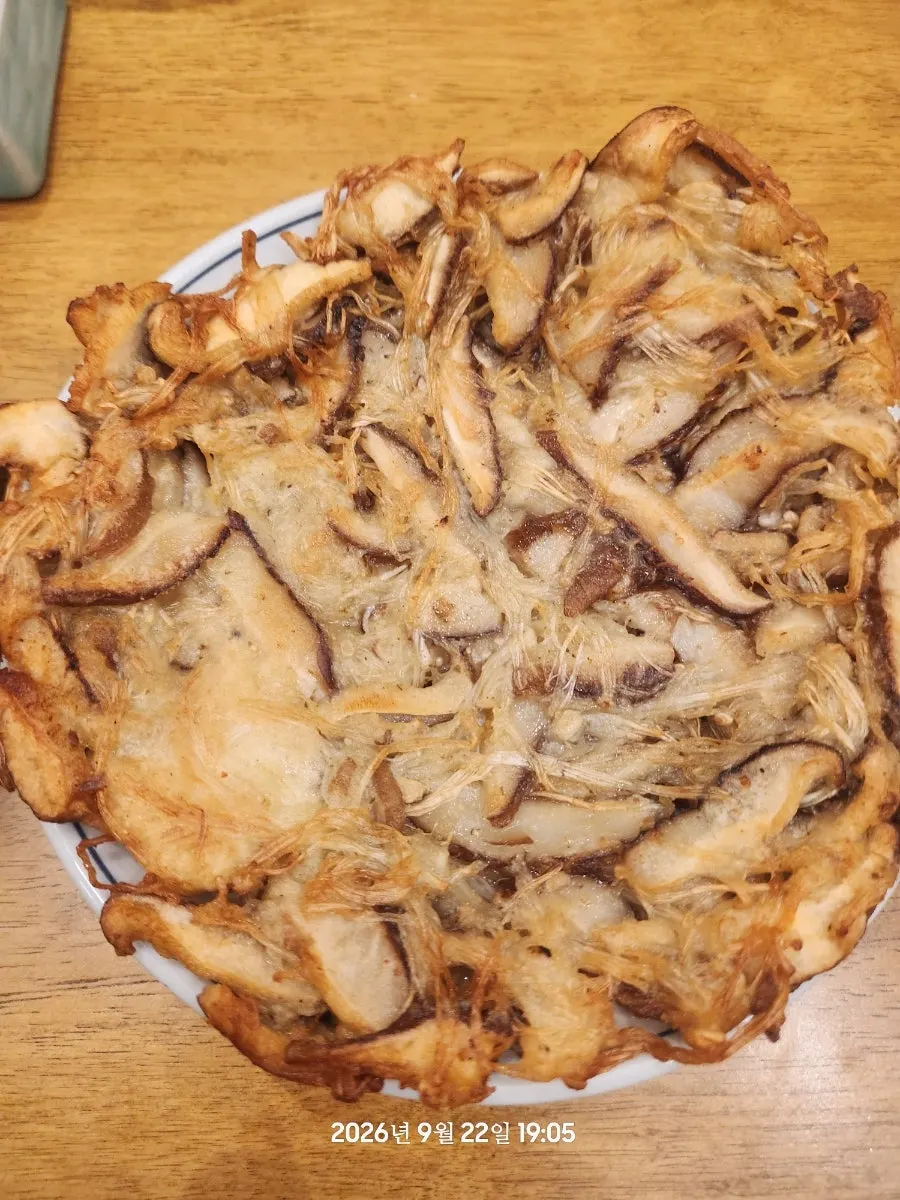 Mushroom pancake generously piled with mushrooms