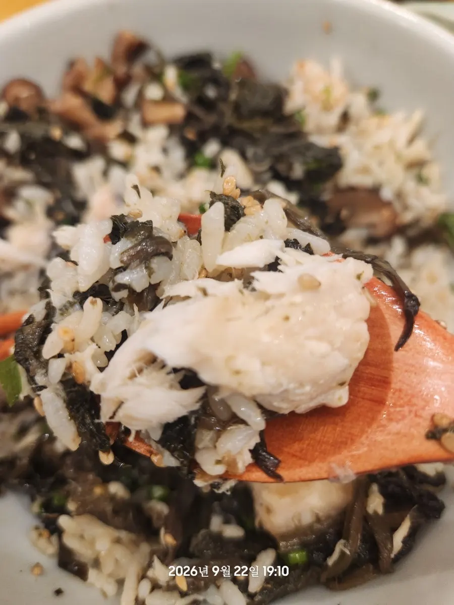 A spoonful of the mixed mackerel gondre rice