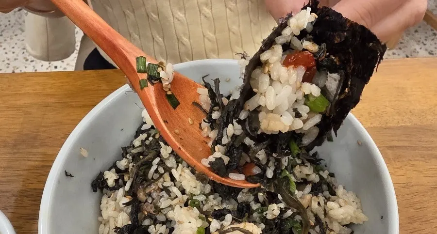 A bite of mackerel flesh with minimal bone hassle