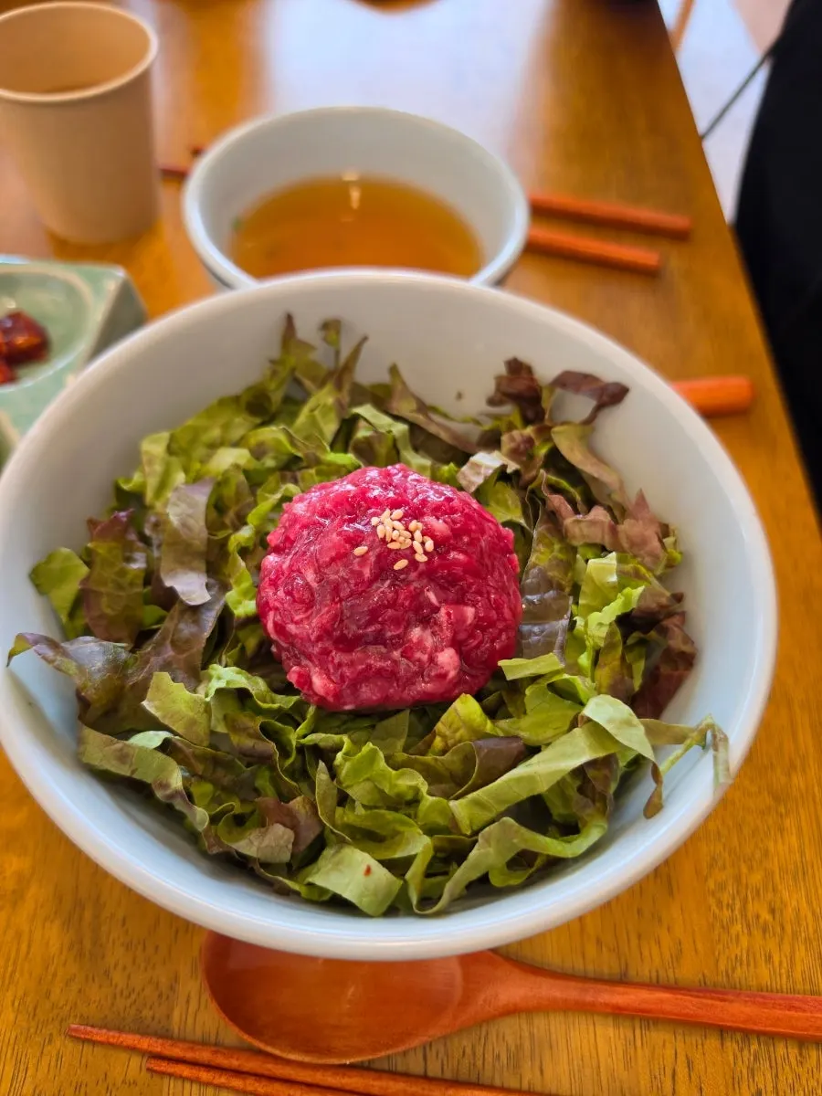Eggplant doenjang rice bowl served with side dishes