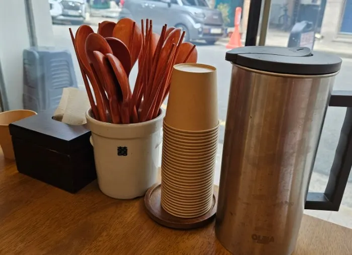 A chilled bottle of water served first at Hyangtaek