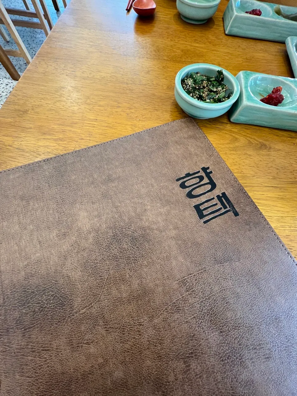 Vertical photo of a Korean meal set at Hyangtaek Seongseo Keimyung University Branch