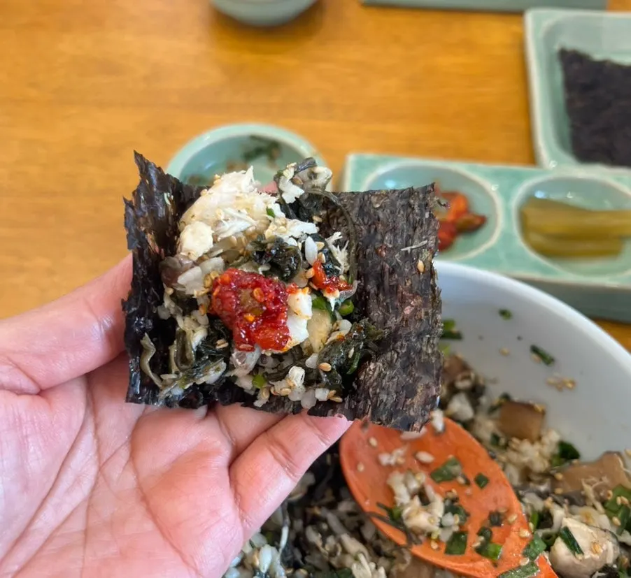 Hyangtaek's special sauce served separately in a ceramic dish