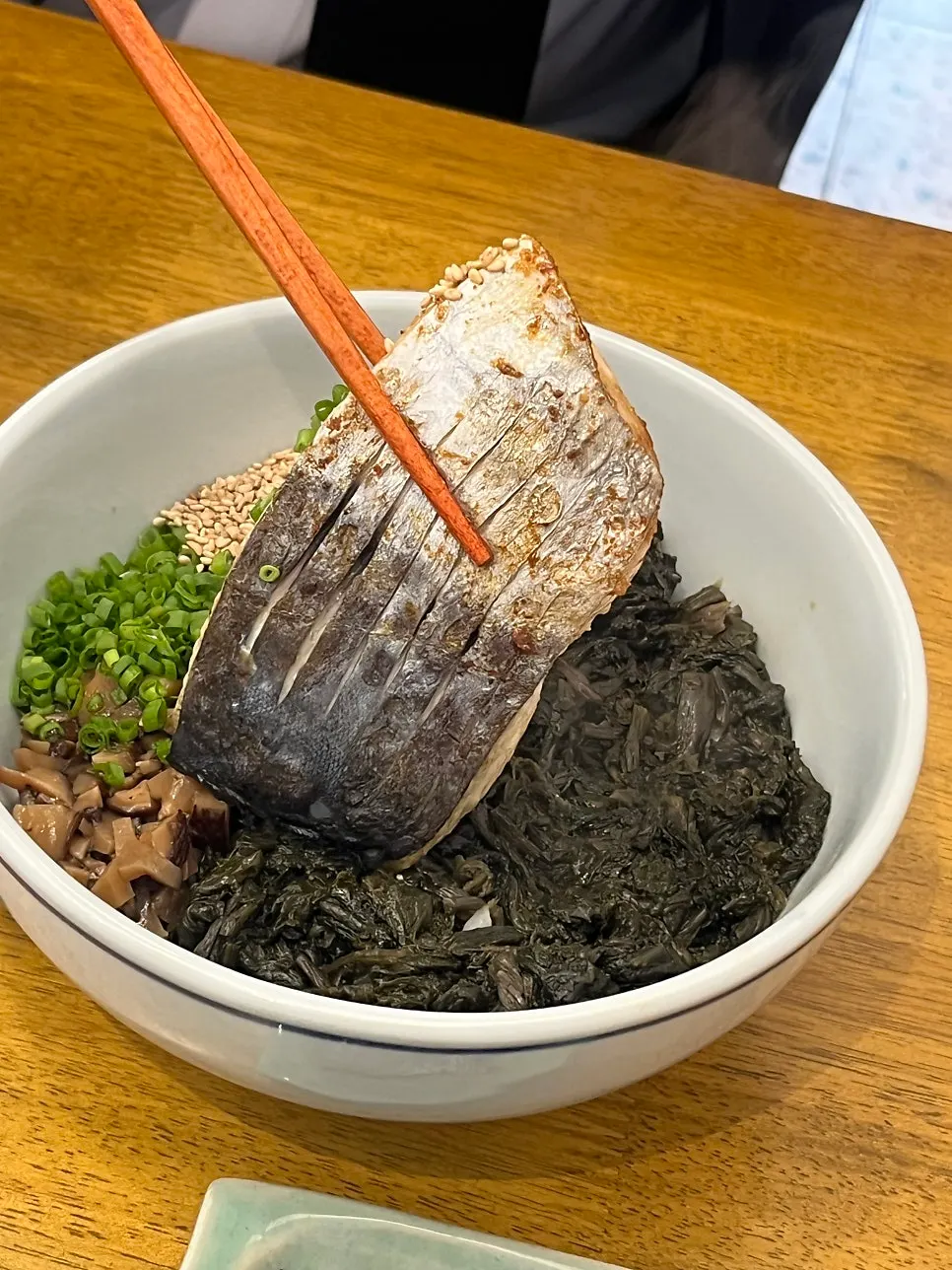 Close-up of grilled mackerel and gondre rice