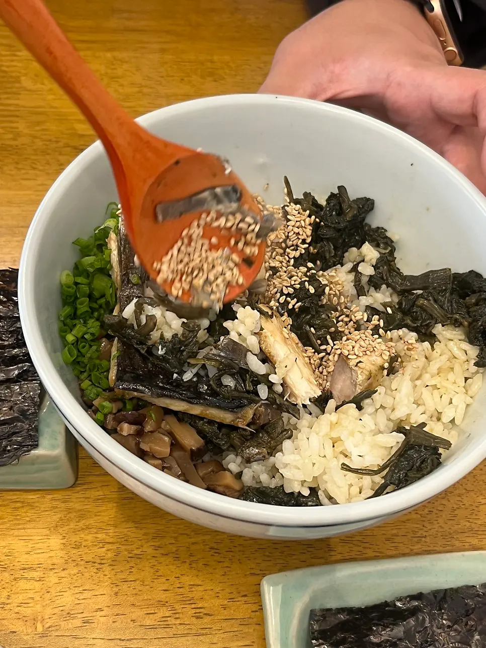 Braised mushrooms on top of mackerel gondre rice