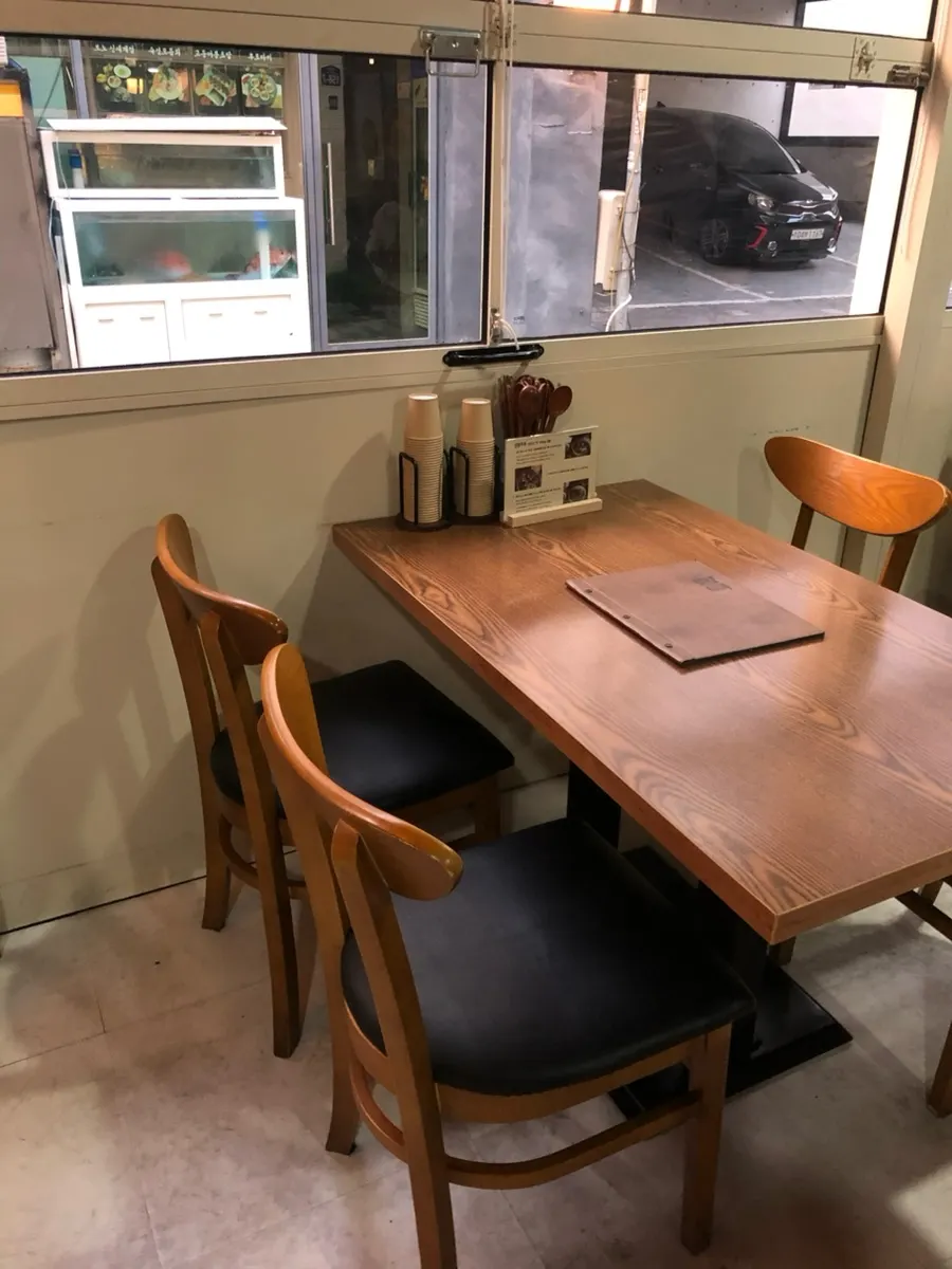 Wood-toned dining hall at Hyangtaek