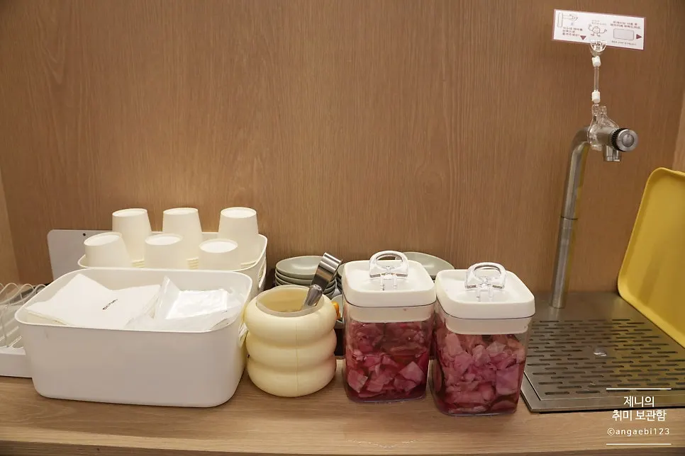 Self-service bar with pickles and water
