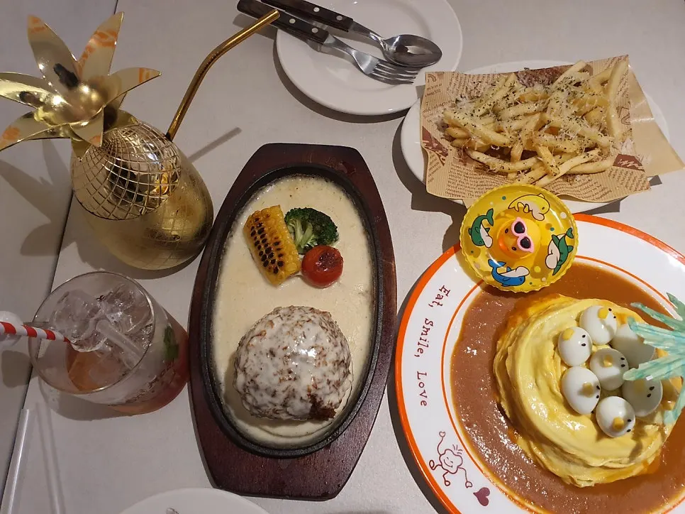 Full spread of Omil food and ades