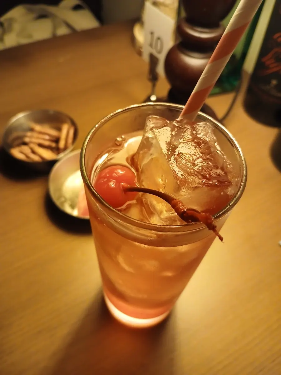 Non-alcoholic Shirley Temple with cherry and straw