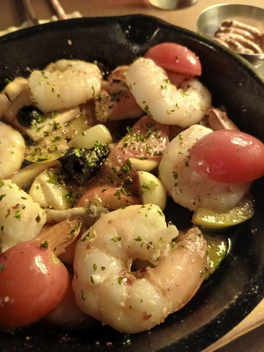 Spanish-style king shrimp gambas in a cast-iron pan