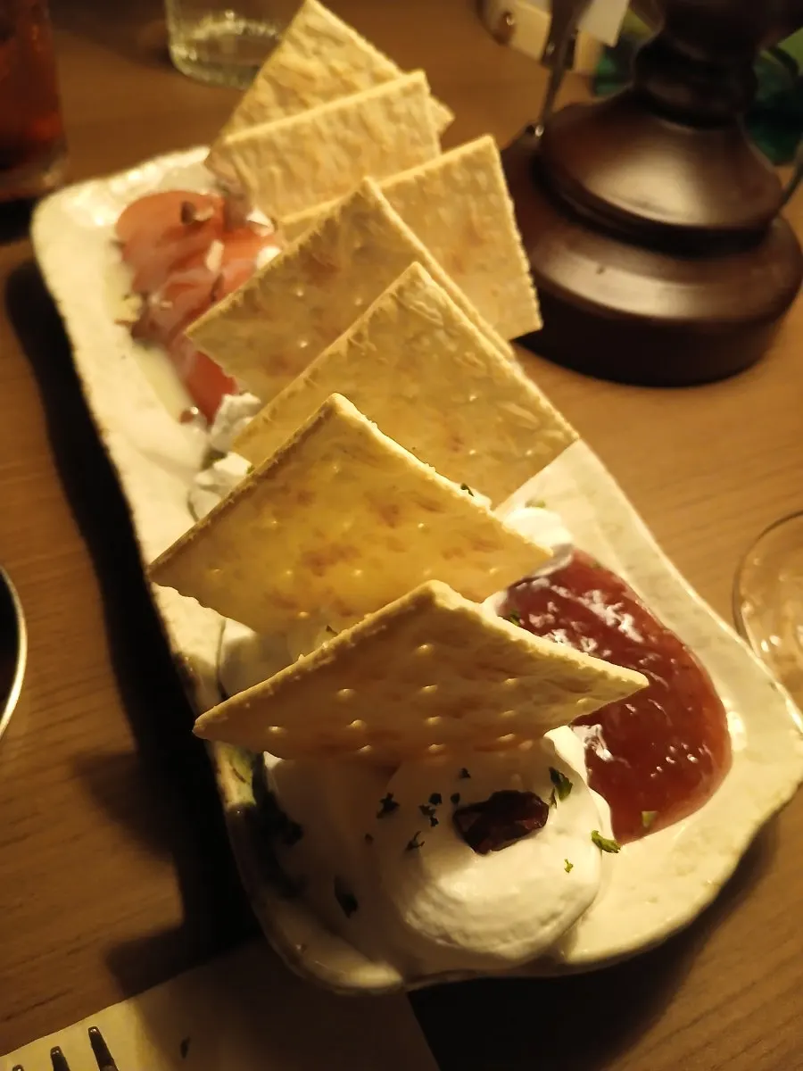 Open sandwich made with shrimp and oil on bread