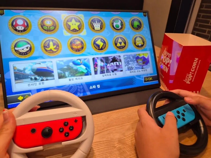 Playing Mario Kart with wheel controllers