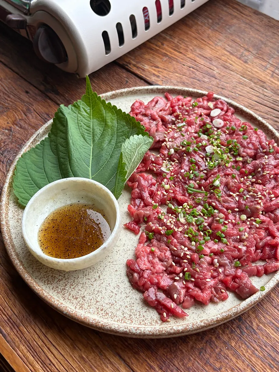 The first dish to arrive, a plate of beef tartare