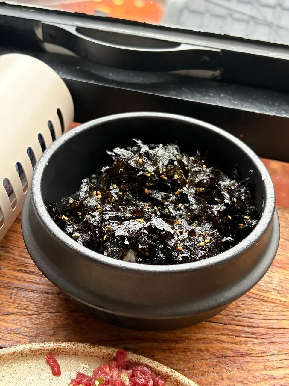 Broth-soaked glass noodles and the added rice ball