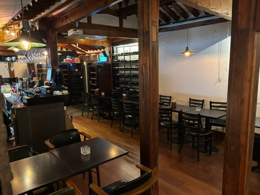 Spacious main hall seating in the hanok-concept wine bar