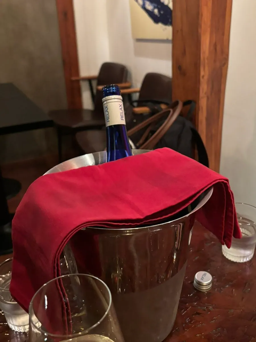 Bottle of Relax Riesling served chilled