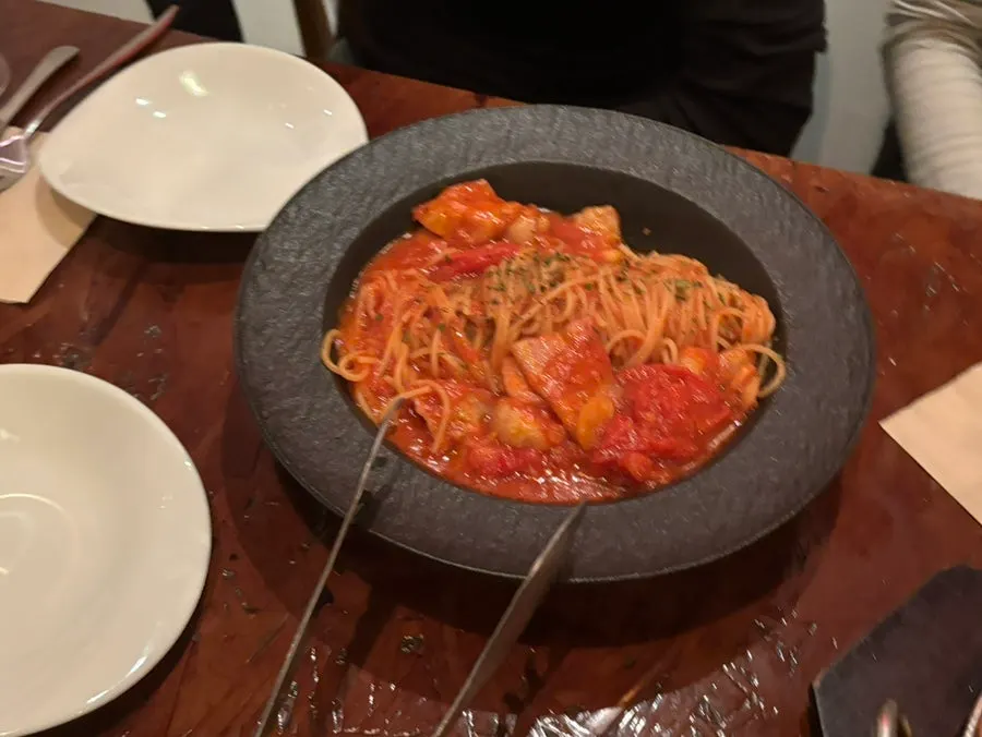 Bacon tomato pasta set on the table