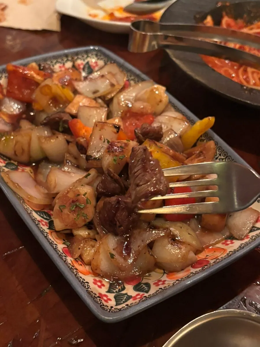 Whole garlic chop steak loaded with vegetables