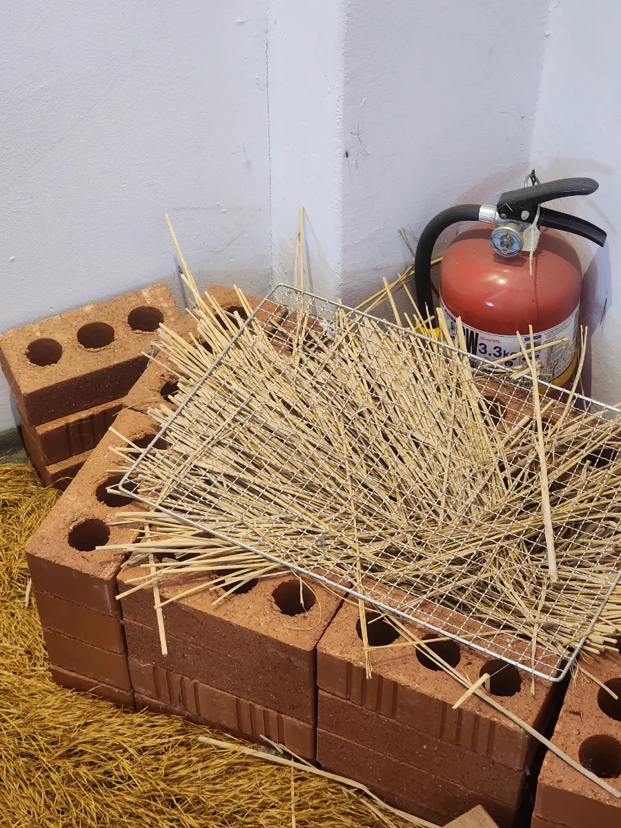 Entrance decor made of straw and wood