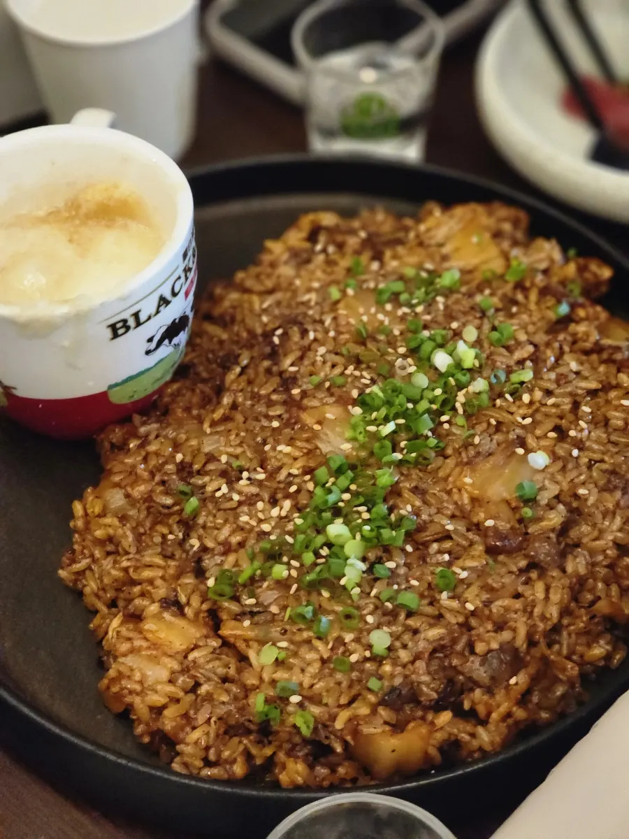Table setting with cheese bomb beef belly kimchi fried rice